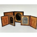 A pair of 19thc embossed leather cases containing early photographs of a young girl with bonnet