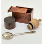 A Continental 800 standard pierced infusing spoon, stamped verso 800, and a treen miniature box (5.