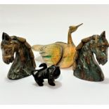 A pair of treen brass mounted horses head figures (10cm x 7cm), a treen carved lion figure with