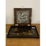 A Chinese hardwood and gilt laquered tray, having a simulated bamboo gallery and decorated with