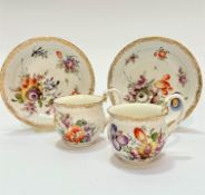 A pair of late 19thc Meissen porcelain cabinet cups decorated with handpainted tulip and rose and