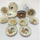 A set of six German modern circular dishes decorated with gilt, exotic birds including peacock, owl,