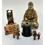 A modern Chinese cast brass seated Buddha on a lotus style base, (20cm x 14cm x 8cm) patented