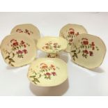 A Limoges style six piece dessert service including two comports (h 12cm and 8cm) and a set of
