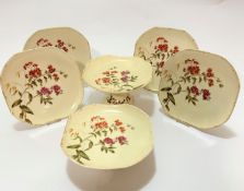 A Limoges style six piece dessert service including two comports (h 12cm and 8cm) and a set of