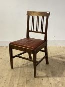 A 19th century mahogany side chair, with reeded spar back, drop in seat pad and square tapered