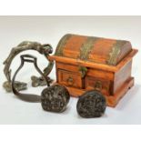 A pair of Indian treen wire mounted elephant printing blocks (8cm x 8cm), a steel stirrup (15cm x