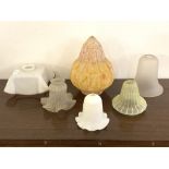 A collection of six early to mid 20th century glass light shades of various styles and designs