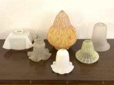 A collection of six early to mid 20th century glass light shades of various styles and designs