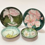 Two Nairn pottery shallow bowls decorated with clematis style design, (7cm x 25cm), one with small