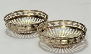 A pair of Birmingham silver pierced bonbon dishes, (2.5cm x 8cm) (44g)