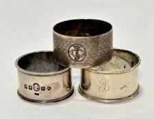 A Glasgow Scottish silver napkin ring with engraved initial E, a Birmingham silver engine turned