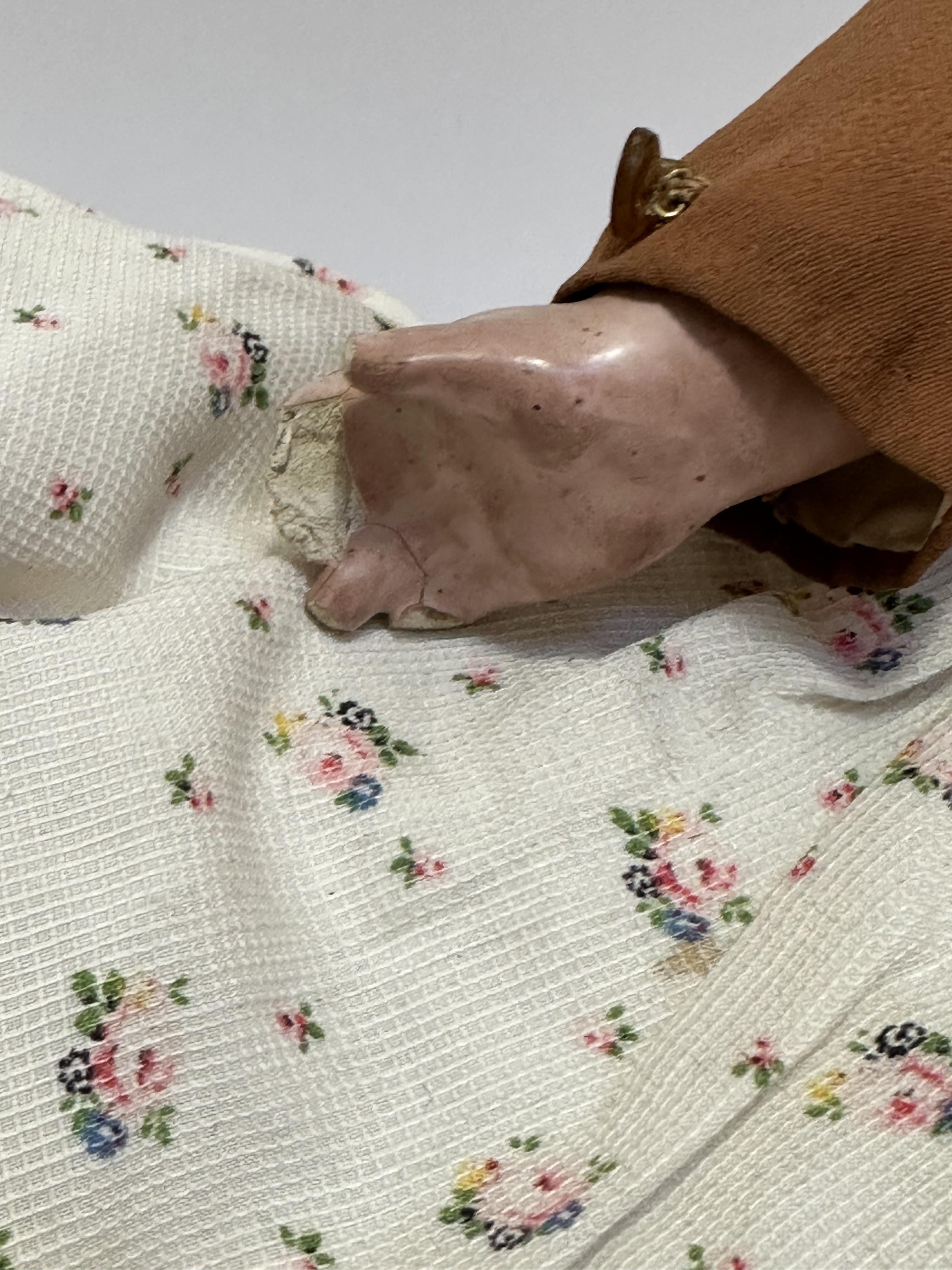 A composition late 19thc early 20thc doll in the Victorian style with stuffed joined body and - Image 6 of 11