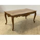 A French style walnut serpentine low table H53cm, 63cm x 117cm