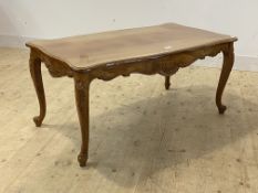 A French style walnut serpentine low table H53cm, 63cm x 117cm