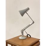 A vintage Herbert Terry angle poise lamp, stamped by maker