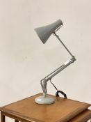 A vintage Herbert Terry angle poise lamp, stamped by maker
