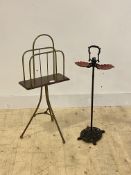 An early to mid 20th century brass and mahogany free standing magazine rack on a tripod base (H79cm)