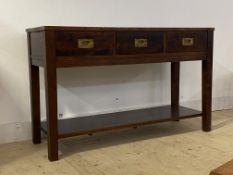 A hardwood and brass bound hall table, fitted with three drawers having recessed pull handles,