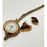 A vintage 9ct gold lady's wristwatch with enamel dial and Arabic numerals, on silver gold plated