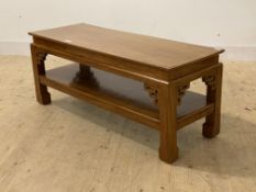 A Chinese style walnut low table of oblong form with square section supports united by under tier,