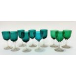 A set of six blue Edwardian cordial glasses, (13.5cm x 6cm) on clear glass stems, three green