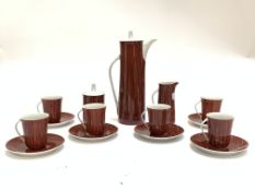 A Retro Coffee Set 'Cmieilow Made In Poland' comprising six cups and saucers, sugar basin, coffee