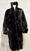 A Beaver Lamb lady's fur coat circa 1930, with cowl neck and rolled cuffs satinised lining (l- 103cm