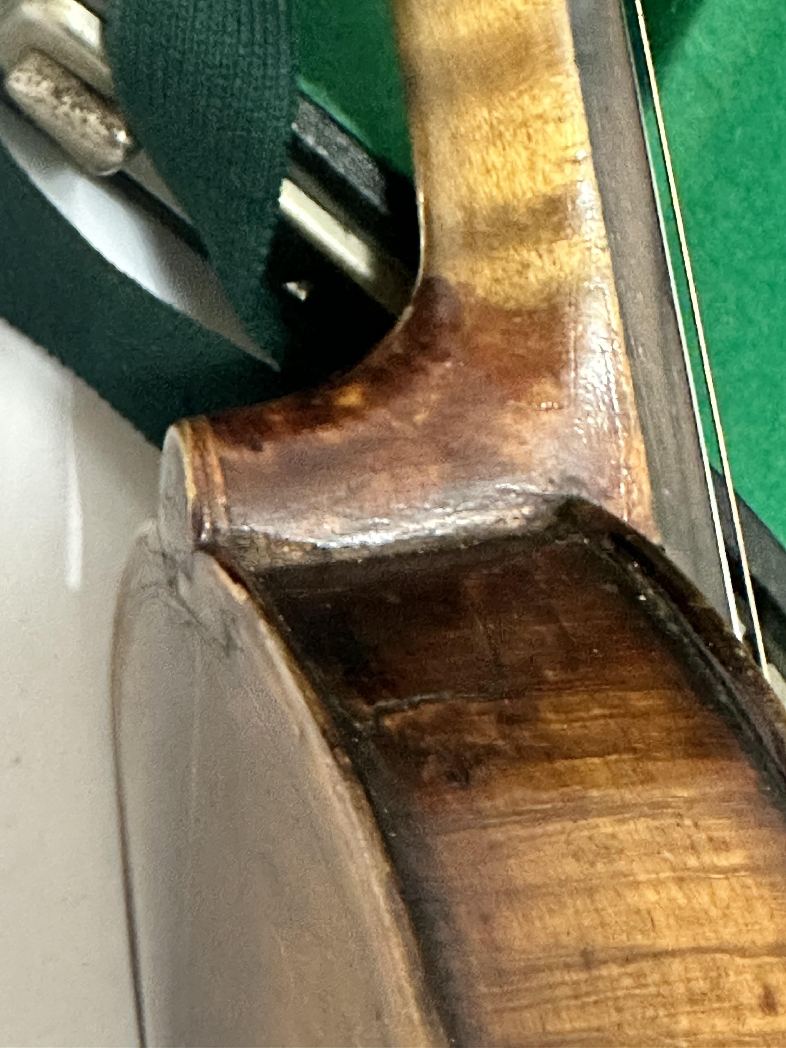 An Italian Magini two piece violin with paper label D E U T I C H E U R B E I T, spilt at back and - Image 6 of 8