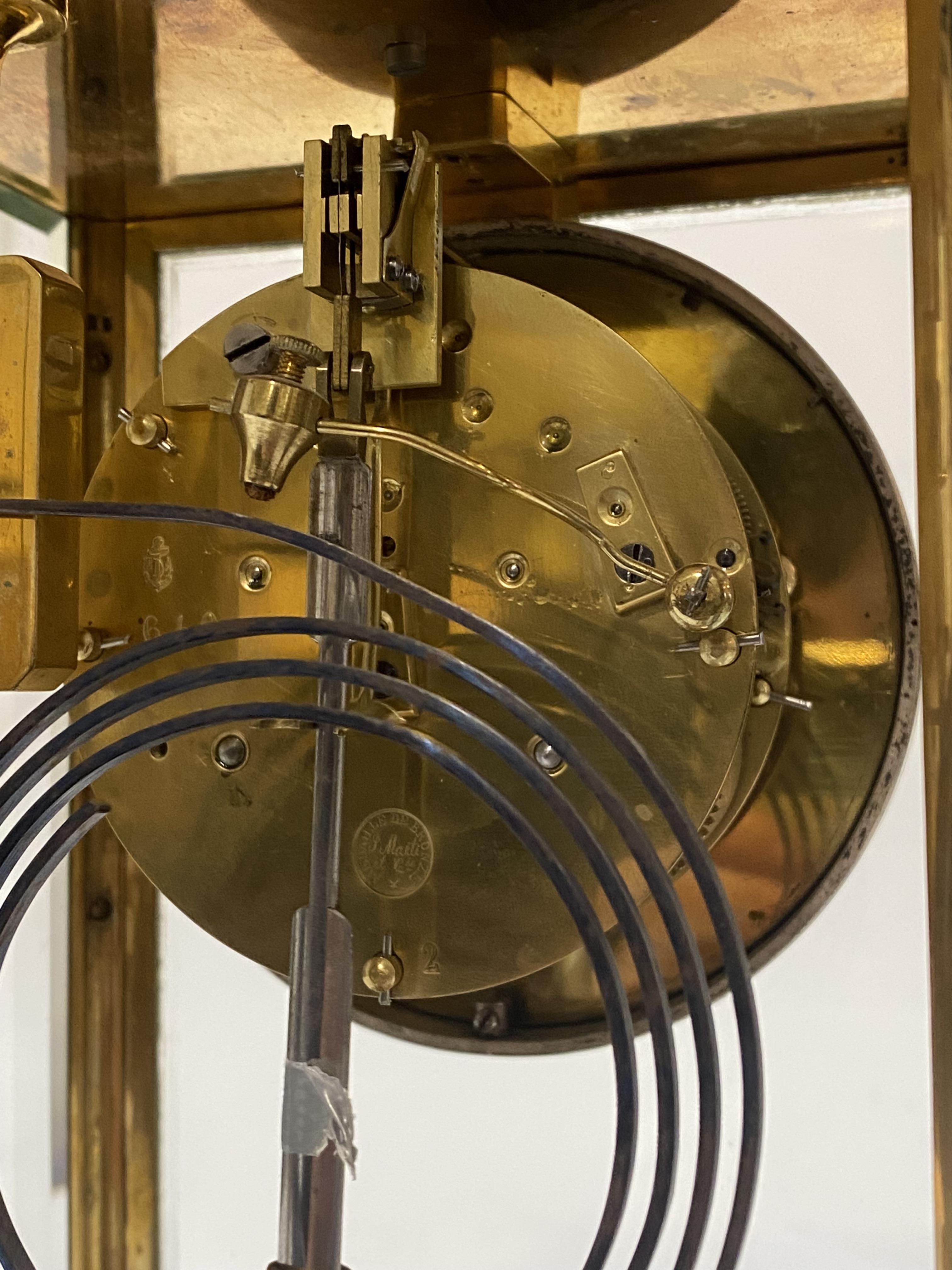 A French brass and four glass clock, circa 1890, the case with filigree frieze, pilasters and - Image 2 of 2