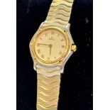 A lady's Swiss Ebel wristwatch Quartz Wave the champagne dial with Roman numerals and 18ct gold