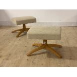 Ercol, a pair of foot stools, upholstered in oatmeal chenille fabric, raised on a blonde elm four