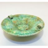 A Beswick ware pottery Deco fruit bowl with ribbed design and ring handles to sides with mottled