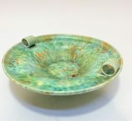 A Beswick ware pottery Deco fruit bowl with ribbed design and ring handles to sides with mottled