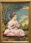 An Edwardian gilt glazed frame with a petit and grospoint panel depicting a young girl in pink dress