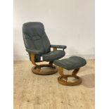 Ekornes, a Stressless reclining lounge chair and footstool, upholstered in green leather, (frame A/