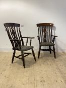 A pair of early 20th century stained beech country armchairs, with upholstered seats and turned