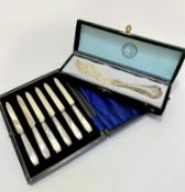 A set of six mother of pearl handled Epns bladed tea knives, show signs of use, complete with