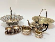 An Epns three piece chased tea serving including teapot, sugar basin and milk jug, an Epns swing
