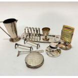 A plated Epns toast rack and butter dish and a plated tapered cylinder milk jug, an Epns egg cup,
