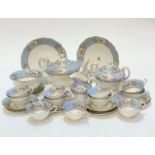 A 19thc china twenty eight piece tea service including two cake plates, teapot (with hairline crack)
