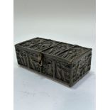 A reproduction Medieval style cast brass casket depicting scenes of Mary and Joseph etc to four