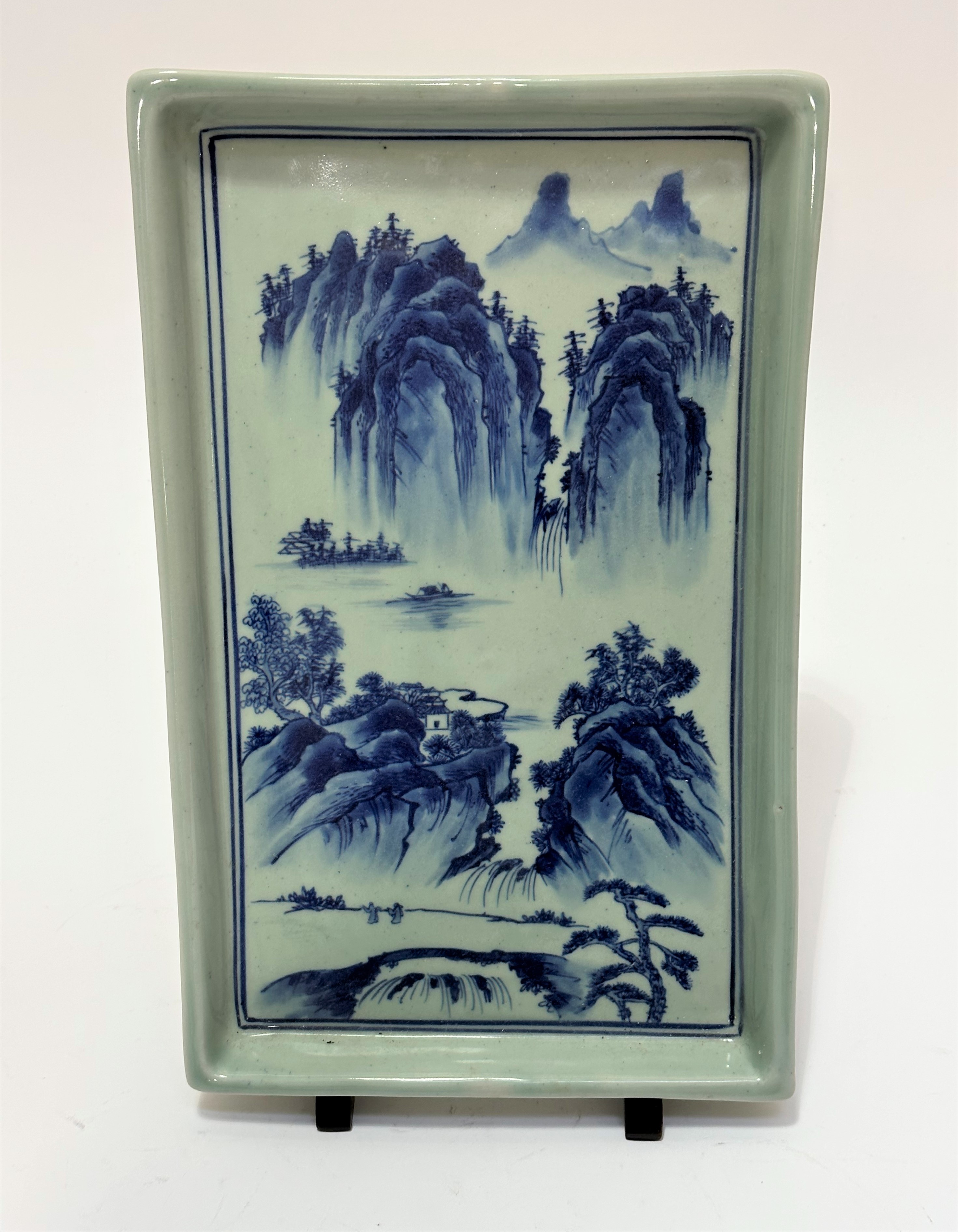 A rectangular Chinese porcelain dish decorated with scene of mountains and boats, fishermen etc no