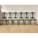 A set of six patinated metal dining chairs with upholstered seats, H100cm