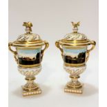 A pair of Coalport china commemorative companion style two handled urns and covers, decorated with