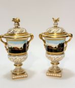 A pair of Coalport china commemorative companion style two handled urns and covers, decorated with