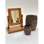 A pair of oak treen fluted carved storage containers with carved centre circular panels, (12cm x 7.