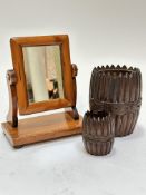 A pair of oak treen fluted carved storage containers with carved centre circular panels, (12cm x 7.