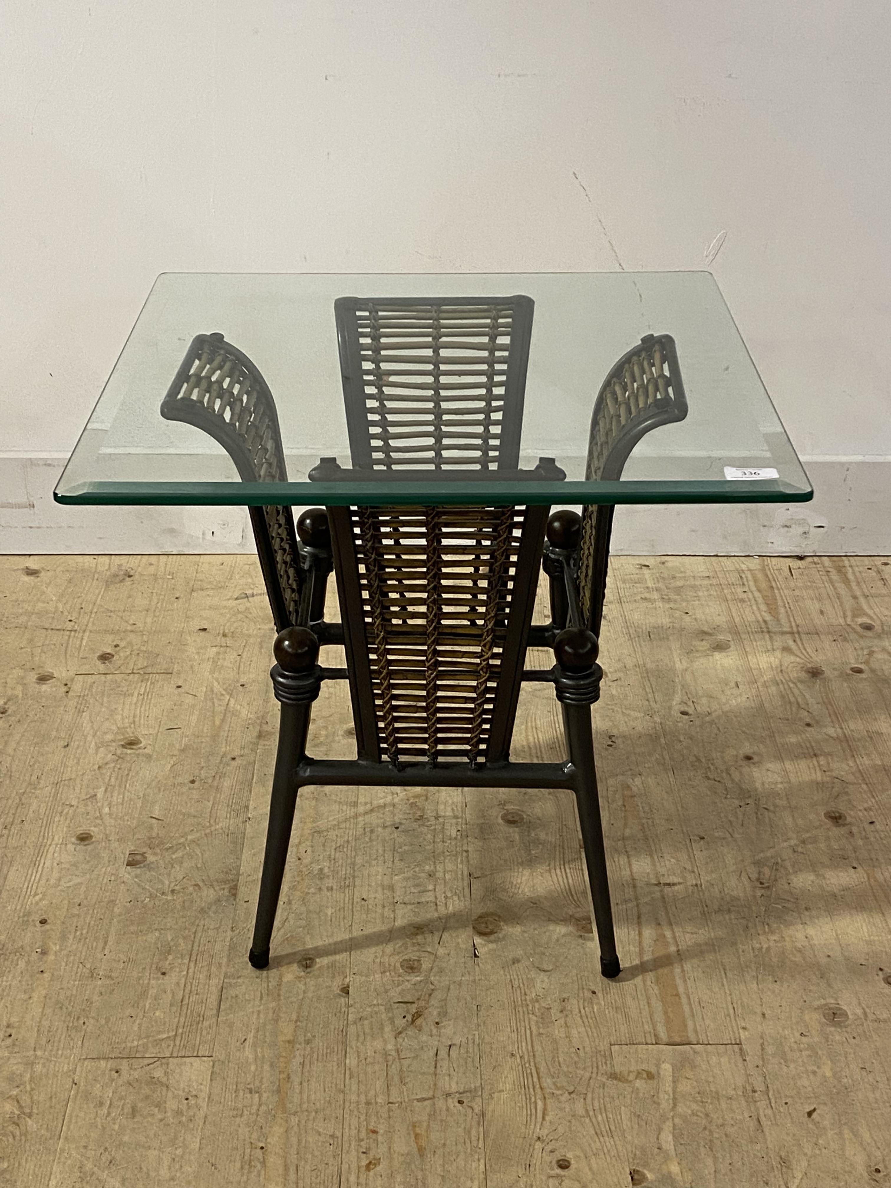 A cast metal and glass lamp table, H52cm, 55cm x 55cm