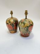 A pair of ovoid baluster vase table lamps with decoupage style floral leaf and chrysanthemum
